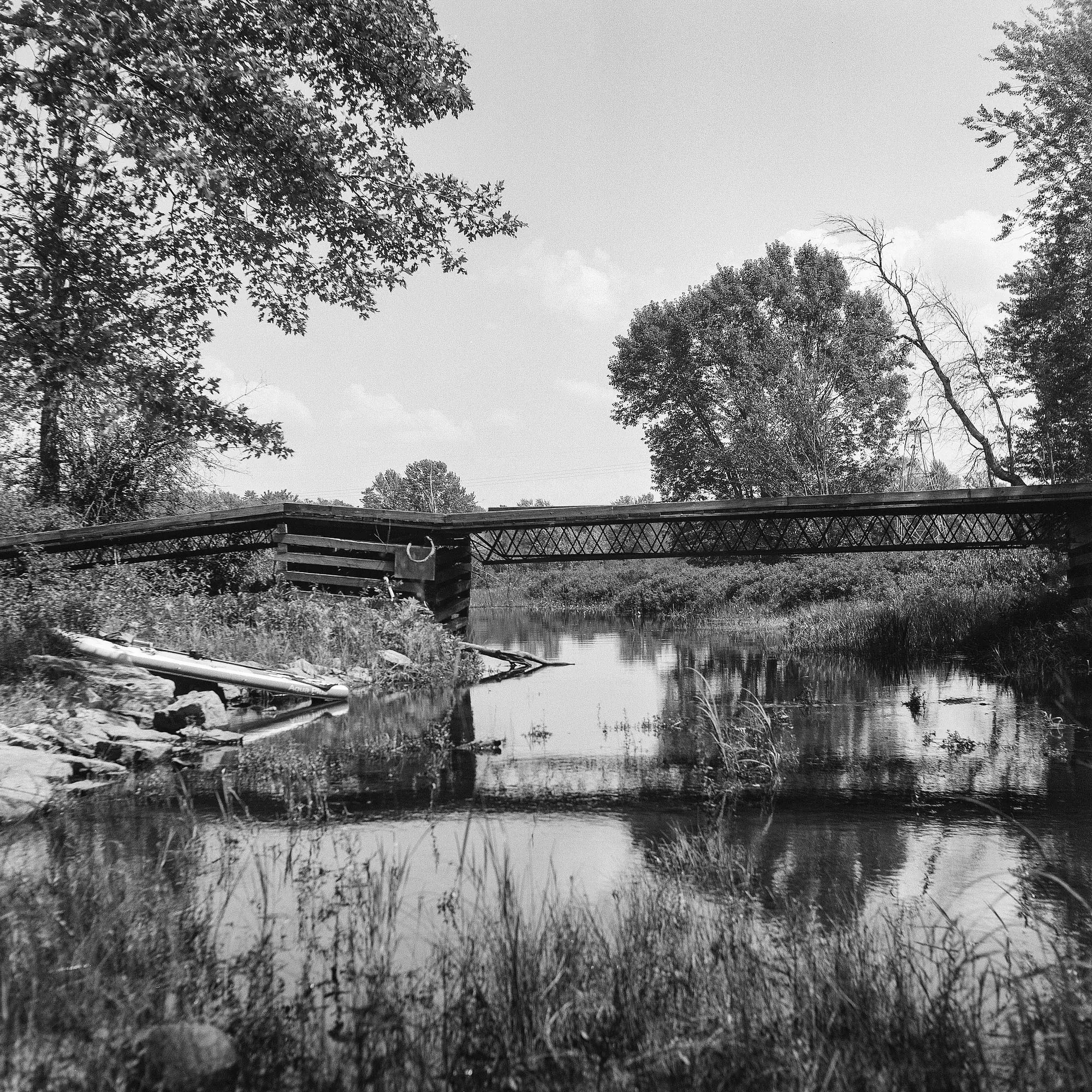Abandoned Bridge and Paddleboard